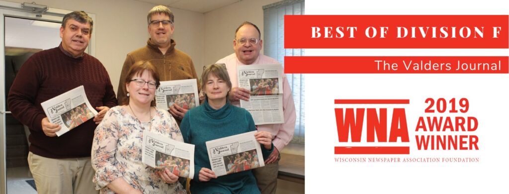 Brian Thomen (far left) is pictured with his wife, Mary, (second from the left) and staff of the Valders Journal. (Photo submitted)